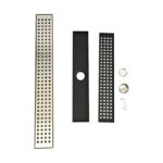 Bagno con doccia a grande spostamento in acciaio inox con scarico a pavimento a griglia con foro rettangolare